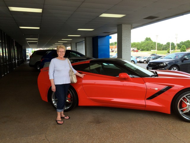 The woman is far more amazing the car!